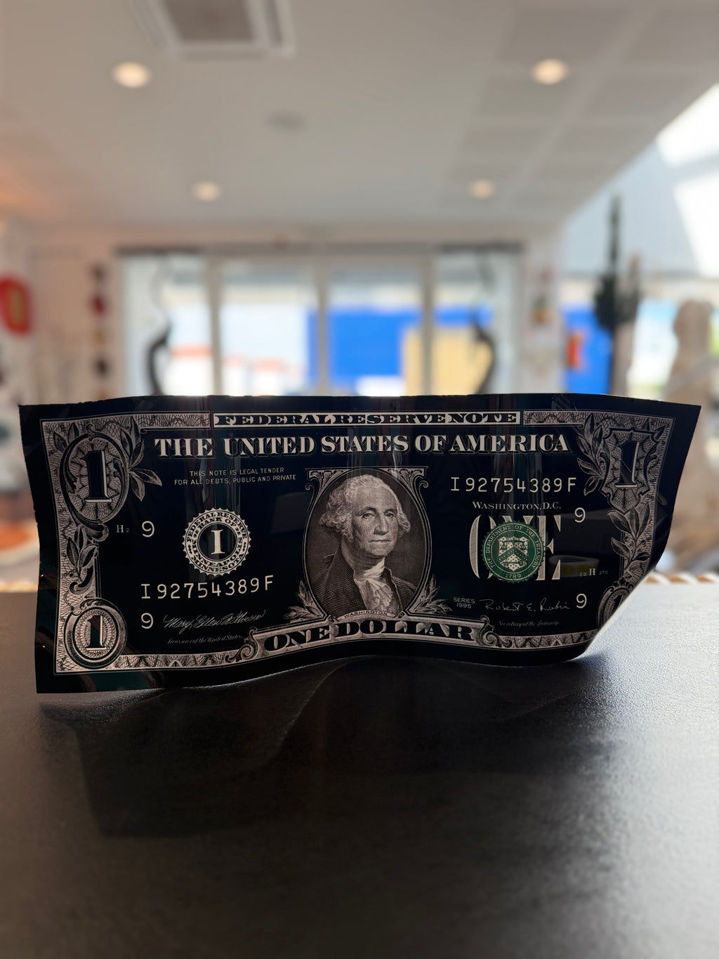 Sculpture Pop Art « One Dollar » en aluminium — Karl Lagasse